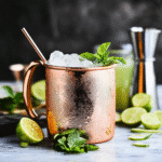 Kentucky Mule Recipe Easy – A Refreshing Southern Twist You’ll Love 5 Kentucky Mule Recipe Easy – A classic copper mug filled with bourbon, ginger beer, and lime, garnished with a fresh mint sprig and ice cubes.