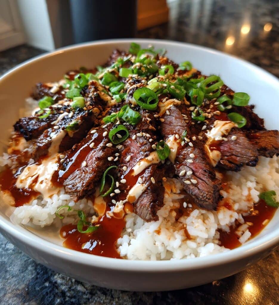 juicy korean bbq steak rice bowls with spicy cream sauce